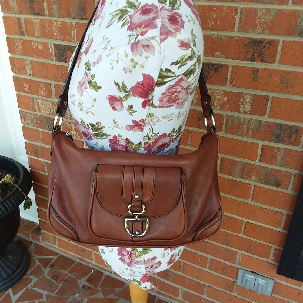 Etienne Aigner brown leather purse.